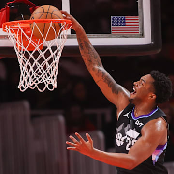 Apr 6, 2025; Atlanta, Georgia, USA; Utah Jazz forward Brice Sensabaugh (28) dunks against the Atlanta Hawks in the second quarter at State Farm Arena. Mandatory Credit: Brett Davis-Imagn Images