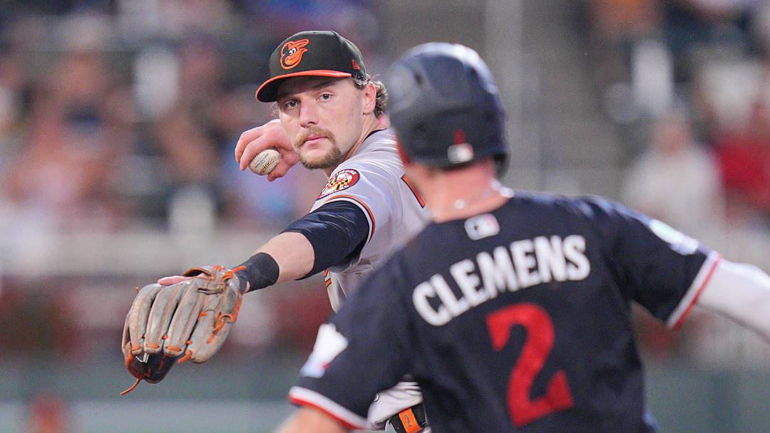 Aug 11, 2026; Minneapolis, Minnesota, USA; Baltimore Orioles shortstop Gunnar Henderson (2) turns the double play against the Minnesota Twins second baseman Kody Clemens (2) in the fifth inning at Target Field. Mandatory Credit: Brad Rempel-Imagn Images