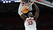 Jan 18, 2024; Salt Lake City, Utah, USA; Utah Utes center Keba Keita (13) dunks the ball against the Oregon State Beavers during the second half at Jon M. Huntsman Center. Mandatory Credit: Rob Gray-USA TODAY Sports