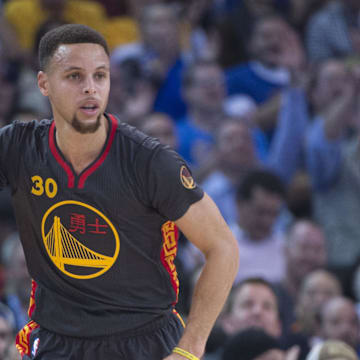 February 9, 2016; Oakland, CA, USA; Golden State Warriors guard Stephen Curry (30) celebrates against the Houston Rockets during the first quarter at Oracle Arena. Mandatory Credit: Kyle Terada-Imagn Images