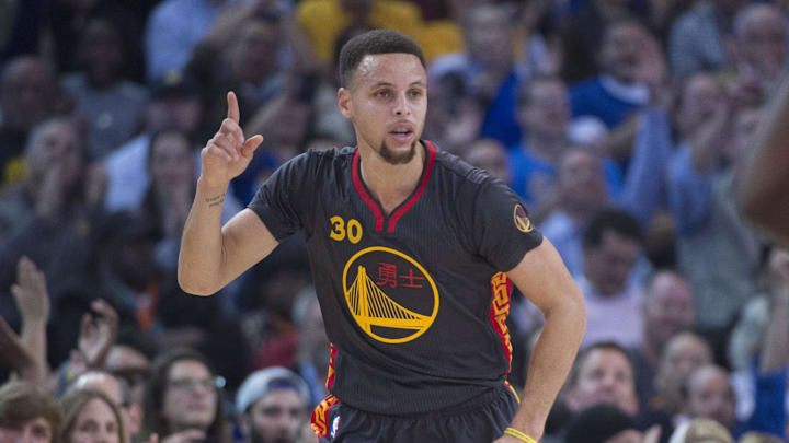 February 9, 2016; Oakland, CA, USA; Golden State Warriors guard Stephen Curry (30) celebrates against the Houston Rockets during the first quarter at Oracle Arena. Mandatory Credit: Kyle Terada-Imagn Images