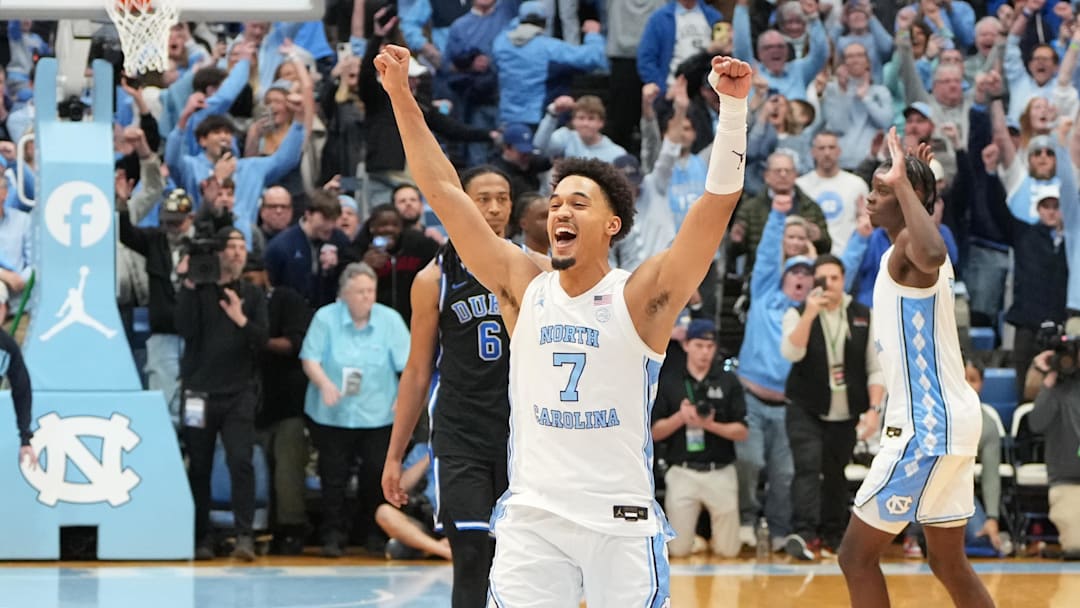 Feb 7, 2026; Chapel Hill, North Carolina, USA; North Carolina Tar Heels guard Seth Trimble (7) celebrates with teammates after the game at Dean E. Smith Center. Mandatory Credit: Bob Donnan-Imagn Images