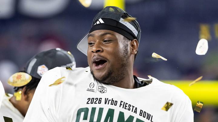 Jan 8, 2026; Glendale, AZ, USA; Miami Hurricanes defensive lineman Ahmad Moten Sr celebrates after defeating the Mississippi Rebels during the 2026 Fiesta Bowl and semifinal game of the College Football Playoff at State Farm Stadium. Mandatory Credit: Mark J. Rebilas-Imagn Images