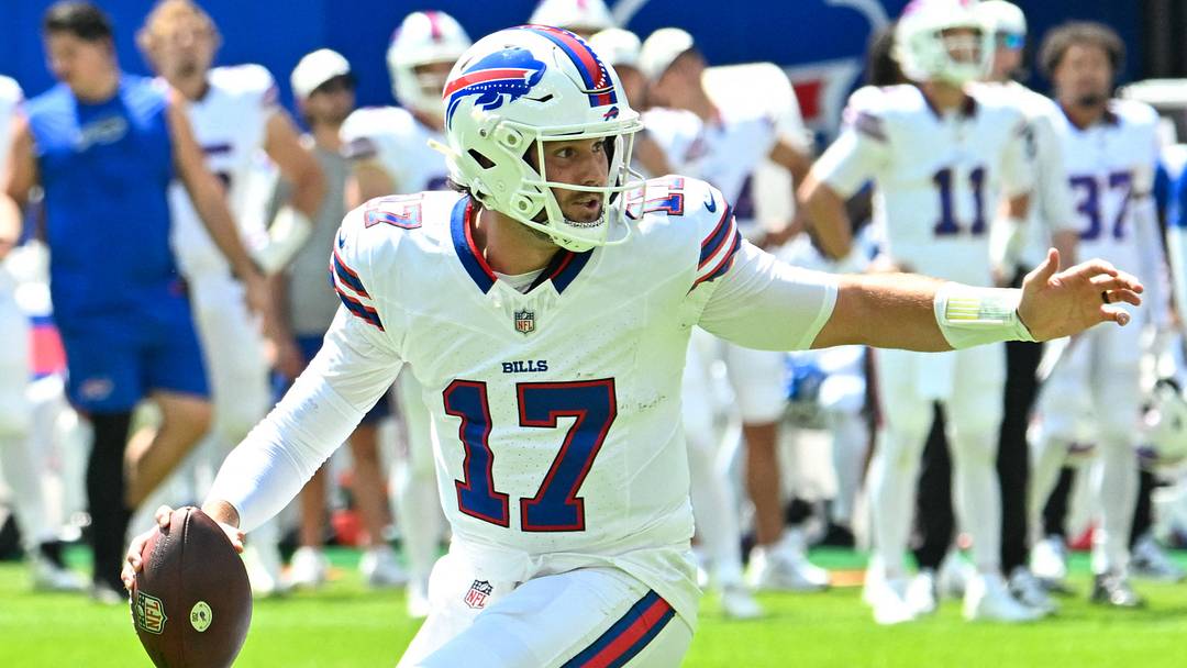 Aug 15, 2026; Orchard Park, New York, USA; Buffalo Bills quarterback Josh Allen (17) moves out of the pocket against the Carolina Panthers in the first quarter at the New Highmark Stadium. 