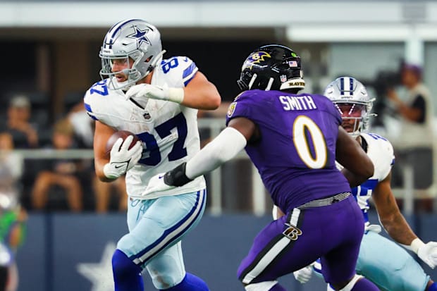  Dallas Cowboys tight end Jake Ferguson (87) runs with the ball