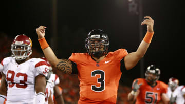 Sep 25, 2008; Corvallis, OR, USA; Oregon State Beavers quarterback Lyle Moevao (3) celebrates a 4th quarter touchdown during at Reser Stadium. Oregon State defeated the Southern California Trojans 27-21. Mandatory Credit: Craig Mitchelldyer-USA TODAY Sports