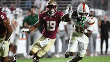 Oct 4, 2025; Tallahassee, Florida, USA; Miami Hurricanes wide receiver Malachi Toney (10) runs against Florida State Seminoles defensive back Jerry Wilson (19) during the second half at Doak S. Campbell Stadium. Mandatory Credit: Robert Myers-Imagn Images