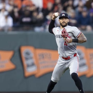 Minnesota Twins shortstop Carlos Correa (4) throws to first base for an out against the San Francisco Giants during the fourth inning at Oracle Park in San Francisco on July 12, 2024. 