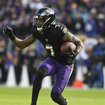 Baltimore Ravens wide receiver Rashod Bateman (7) runs after the catch during the first quarter against the Miami Dolphins at M&T Bank Stadium. 