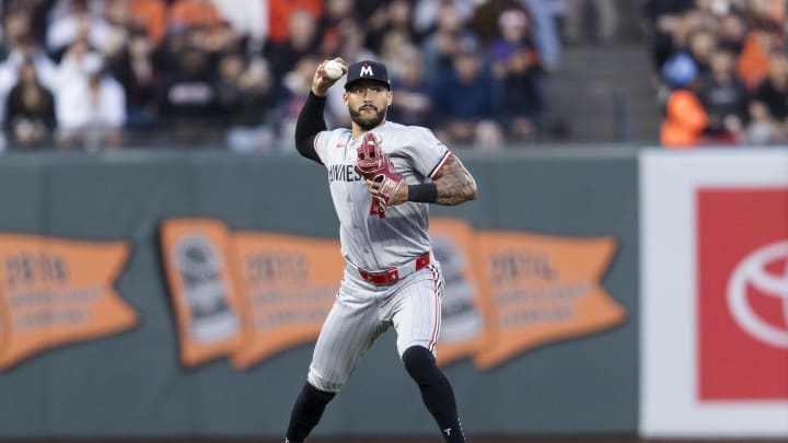 Minnesota Twins shortstop Carlos Correa (4) throws to first base for an out against the San Francisco Giants during the fourth inning at Oracle Park in San Francisco on July 12, 2024.