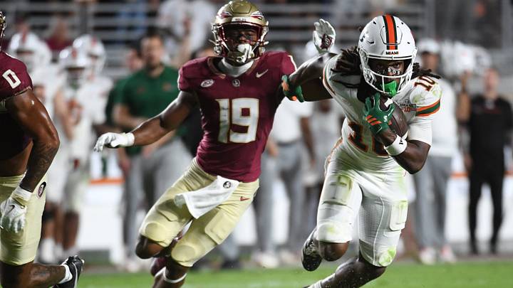 Oct 4, 2025; Tallahassee, Florida, USA; Miami Hurricanes wide receiver Malachi Toney (10) runs against Florida State Seminoles defensive back Jerry Wilson (19) during the second half at Doak S. Campbell Stadium. Mandatory Credit: Robert Myers-Imagn Images