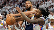 Minnesota Timberwolves center Rudy Gobert attempts to shoot the ball against Oklahoma City Thunder guard Cason Wallace in the second half during Game 4 of the Western Conference finals at Target Center in Minneapolis on May 26, 2025. 