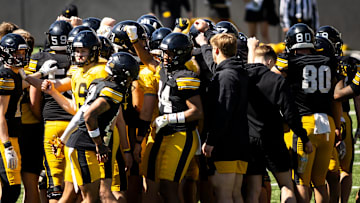 Apr 26, 2025; Iowa City, IA, USA; Iowa Hawkeyes players huddle up during a spring NCAA football open practice at Kinnick Stadium. Mandatory Credit: Joseph Cress/For the Register