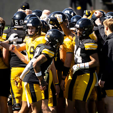 Apr 26, 2025; Iowa City, IA, USA; Iowa Hawkeyes players huddle up during a spring NCAA football open practice at Kinnick Stadium. Mandatory Credit: Joseph Cress/For the Register