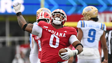 Oct 25, 2025; Bloomington, Indiana, USA; Indiana Hoosiers defensive lineman Hosea Wheeler (0) celebrates after recovering a fumble during the first half against the UCLA Bruins at Memorial Stadium. Mandatory Credit: Robert Goddin-Imagn Images