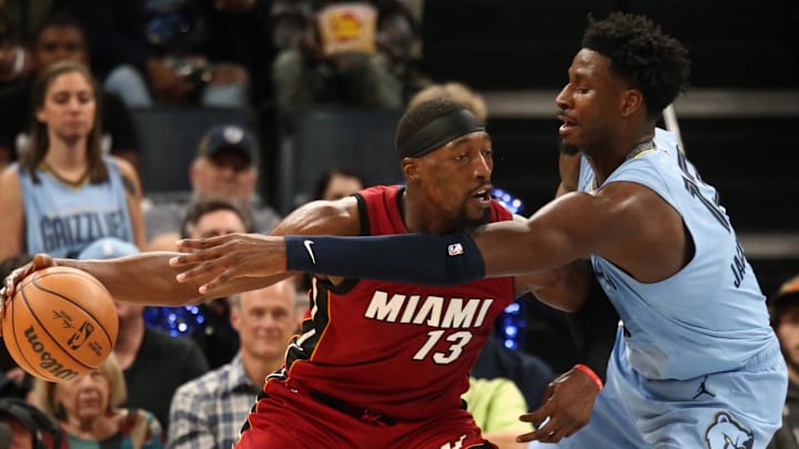 Nov 8, 2023; Memphis, Tennessee, USA; Miami Heat center Bam Adebayo (13) dribbles as Memphis Grizzlies forward-center Jaren Jackson Jr. (13) defends during the second half at FedExForum. Mandatory Credit: Petre Thomas-Imagn Images