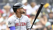 Sep 28, 2025; San Diego, California, USA; Arizona Diamondbacks second baseman Ketel Marte (4) hits a solo home run during the first inning against the San Diego Padres at Petco Park. Mandatory Credit: Denis Poroy-Imagn Images