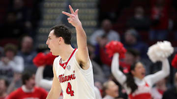 Miami (Oh) Redhawks forward Kam Craft (4) celebrates after knocking down a three late in the second half of an NCAA college basketball game against Kent State in the semifinals of the Mid-American Conference Tournament at Rocket Arena on Friday, March 14, 2025, in Cleveland, Ohio.