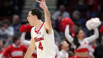 Miami (Oh) Redhawks forward Kam Craft (4) celebrates after knocking down a three late in the second half of an NCAA college basketball game against Kent State in the semifinals of the Mid-American Conference Tournament at Rocket Arena on Friday, March 14, 2025, in Cleveland, Ohio.