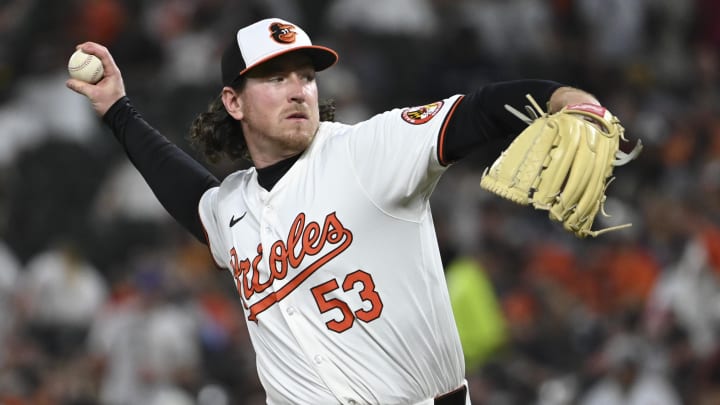 May 1, 2024; Baltimore, Maryland, USA;  Baltimore Orioles pitcher Mike Baumann (53) throws a eighth inning pitch against the New York Yankeesat Oriole Park at Camden Yards. 