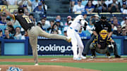 Oct 6, 2024; Los Angeles, California, USA; Los Angeles Dodgers designated hitter Shohei Ohtani (17) strikes out against San Diego Padres pitcher Yu Darvish (11) in the first inning during game two of the NLDS for the 2024 MLB Playoffs at Dodger Stadium.