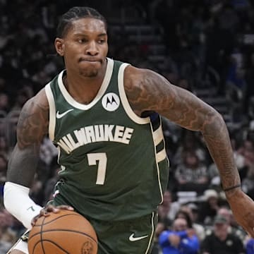 Oct 22, 2025; Milwaukee, Wisconsin, USA; Milwaukee Bucks guard Kevin Porter Jr. (7) drives to the basket against the Washington Wizards in the first half at Fiserv Forum. Mandatory Credit: Michael McLoone-Imagn Images