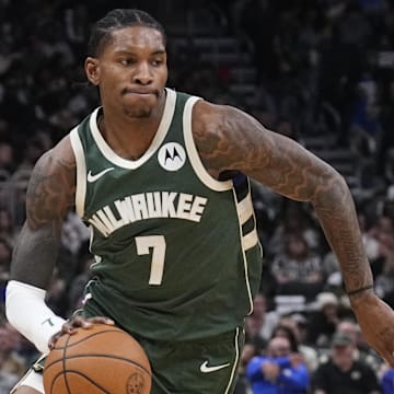 Oct 22, 2025; Milwaukee, Wisconsin, USA; Milwaukee Bucks guard Kevin Porter Jr. (7) drives to the basket against the Washington Wizards in the first half at Fiserv Forum. Mandatory Credit: Michael McLoone-Imagn Images