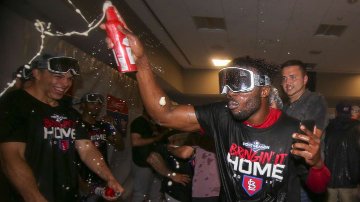 Oct 9, 2019; Atlanta, GA, USA; St. Louis Cardinals left fielder Randy Arozarena (66) celebrates after defeating the Atlanta Braves in game five of the 2019 NLDS playoff baseball series at SunTrust Park. Mandatory Credit: Brett Davis-USA TODAY Sports