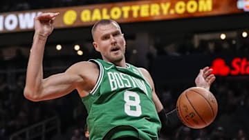 Kristaps Porzingis #8 of the Boston Celtics looks on after a basket against the Atlanta Hawks.