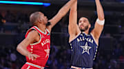 Feb 18, 2024; Indianapolis, Indiana, USA; Eastern Conference forward Jayson Tatum (0) of the Boston Celtics shoots the ball against Western Conference forward Kevin Durant (35) of the Phoenix Suns during the second half of the 73rd NBA All Star game at Gainbridge Fieldhouse. Mandatory Credit: Kyle Terada-Imagn Images