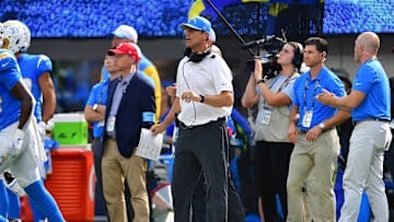 Aug 17, 2024; Inglewood, California, USA; Los Angeles Chargers head coach Jim Harbaugh watches game action against the Los Angeles Rams during the first half at SoFi Stadium. Mandatory Credit: Gary A. Vasquez-Imagn Images