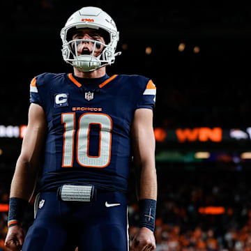 Dec 2, 2024; Denver, Colorado, USA; Denver Broncos quarterback Bo Nix (10) reacts after a play in the third quarter against the Cleveland Browns at Empower Field at Mile High. 