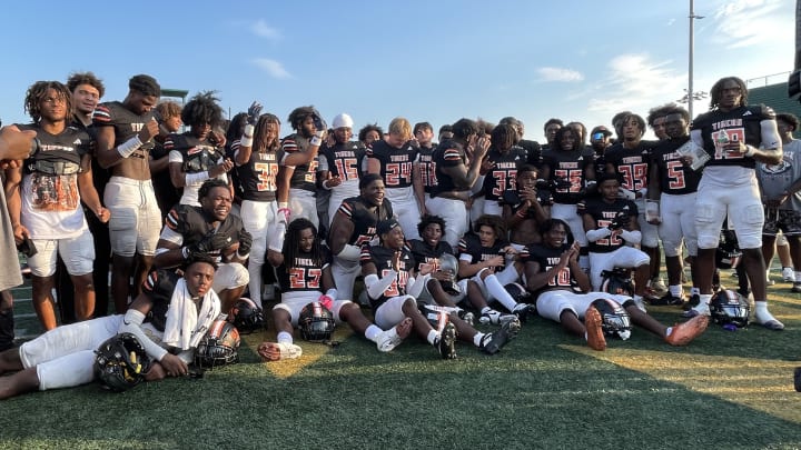 Belleville celebrates its won over Clarkston in the MHSAA Xenith Kickoff Classic in 2024 | Ronnie Martin