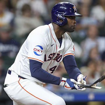 Sep 11, 2024; Houston, Texas, USA; Houston Astros designated hitter Yordan Alvarez (44) breaks his bat on a single during the third inning against the Oakland Athletics at Minute Maid Park.