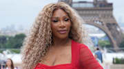 Serena Williams takes photos at the 2024 Paris Olympics.