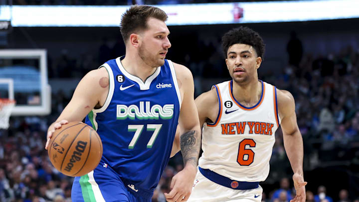 Dec 27, 2022; Dallas, Texas, USA;  Dallas Mavericks guard Luka Doncic (77) drives to the basket past New York Knicks guard Quentin Grimes (6) during the second half at American Airlines Center. Mandatory Credit: Kevin Jairaj-Imagn Images