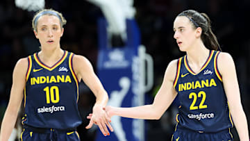 May 3, 2024; Dallas, Texas, USA; Indiana Fever guard Caitlin Clark (22) celebrates with Indiana Fever guard Lexie Hull (10) during the second quarter against the Dallas Wings at College Park Center.  Mandatory Credit: Kevin Jairaj-Imagn Images