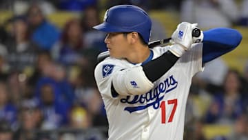 Apr 1, 2025; Los Angeles, California, USA;  Los Angeles Dodgers designated hitter Shohei Ohtani (17) on deck in the first inning against the Atlanta Braves at Dodger Stadium. 