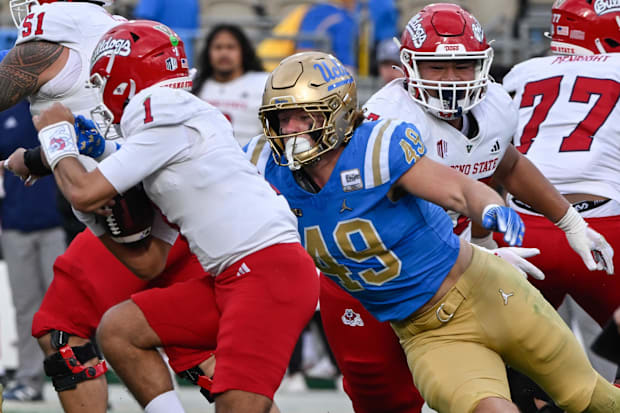 UCLA Bruins linebacker Carson Schwesinger sacks Fresno State Bulldogs quarterback Mikey Keene.