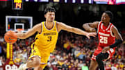 Mar 5, 2025; Minneapolis, Minnesota, USA; Minnesota Golden Gophers forward Dawson Garcia (3) works around Wisconsin Badgers guard John Blackwell (25) during the first half at Williams Arena. Mandatory Credit: Matt Krohn-Imagn Images