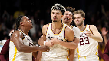 Jan 16, 2025; Minneapolis, Minnesota, USA; Minnesota Golden Gophers forward Dawson Garcia (3) celebrates his game winning three-point basket against the Michigan Wolverines after the game at Williams Arena. Mandatory Credit: Matt Krohn-Imagn Images