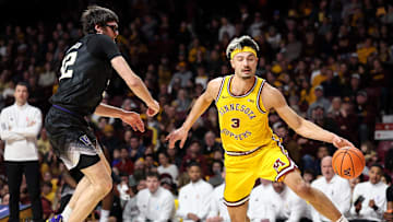 Feb 1, 2025; Minneapolis, Minnesota, USA; Minnesota Golden Gophers forward Dawson Garcia (3) works around Washington Huskies forward Wilhelm Breidenbach (32) defends during the first half at Williams Arena. Mandatory Credit: Matt Krohn-Imagn Images