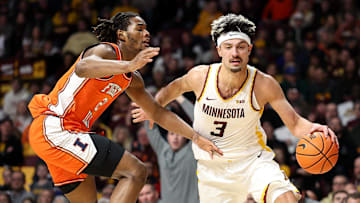 Feb 8, 2025; Minneapolis, Minnesota, USA; Minnesota Golden Gophers forward Dawson Garcia (3) works around Illinois Fighting Illini forward Morez Johnson Jr. (21) during the first half at Williams Arena. Mandatory Credit: Matt Krohn-Imagn Images