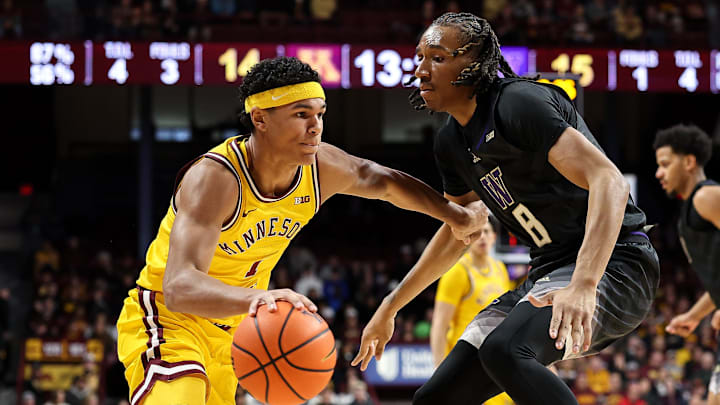 Feb 1, 2025; Minneapolis, Minnesota, USA; Minnesota Golden Gophers guard Isaac Asuma (1) drives towards the basket as Washington Huskies guard Tyler Harris (8) defends during the first half at Williams Arena. Mandatory Credit: Matt Krohn-Imagn Images Feb 1, 2025; Minneapolis, Minnesota, USA; Minnesota Golden Gophers guard Isaac Asuma (1) drives towards the basket as Washington Huskies guard Tyler Harris (8) defends during the first half at Williams Arena. Mandatory Credit: Matt Krohn-Imagn Images