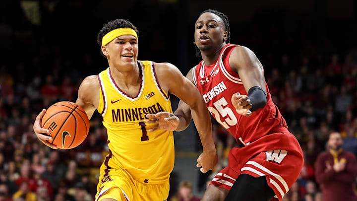 Mar 5, 2025; Minneapolis, Minnesota, USA; Minnesota Golden Gophers guard Isaac Asuma (1) works around Wisconsin Badgers guard John Blackwell (25) during the first half at Williams Arena. Mandatory Credit: Matt Krohn-Imagn Images Mar 5, 2025; Minneapolis, Minnesota, USA; Minnesota Golden Gophers guard Isaac Asuma (1) works around Wisconsin Badgers guard John Blackwell (25) during the first half at Williams Arena. Mandatory Credit: Matt Krohn-Imagn Images