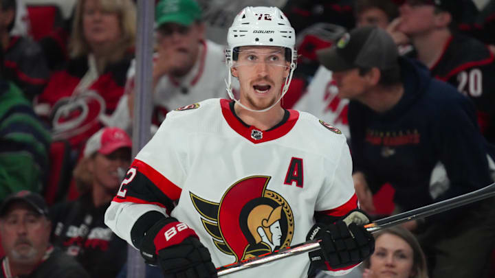 Oct 11, 2023; Raleigh, North Carolina, USA;  Ottawa Senators defenseman Thomas Chabot (72) reacts against the Carolina Hurricanes during the second period at PNC Arena. Mandatory Credit: James Guillory-Imagn Images