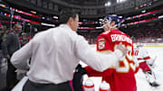 Sep 27, 2023; Raleigh, North Carolina, USA; Carolina Hurricanes head coach Rod Brind   Amour talks to his son Florida Panthers forward Skyler Brind'Amour (89) before the game at PNC Arena. Mandatory Credit: James Guillory-Imagn Images