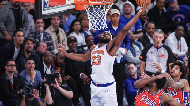 Apr 20, 2024; New York, New York, USA; New York Knicks center Mitchell Robinson (23) goes up for a