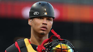 Jun 4, 2025; Pittsburgh, Pennsylvania, USA;  Pittsburgh Pirates catcher Endy Rodriguez (5) looks on from behind the plate against the Houston Astros during the fifth inning at PNC Park. Mandatory Credit: Charles LeClaire-Imagn Images