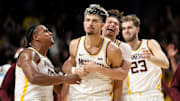 Minnesota Golden Gophers forward Dawson Garcia (3) celebrates his game winning three-point basket 